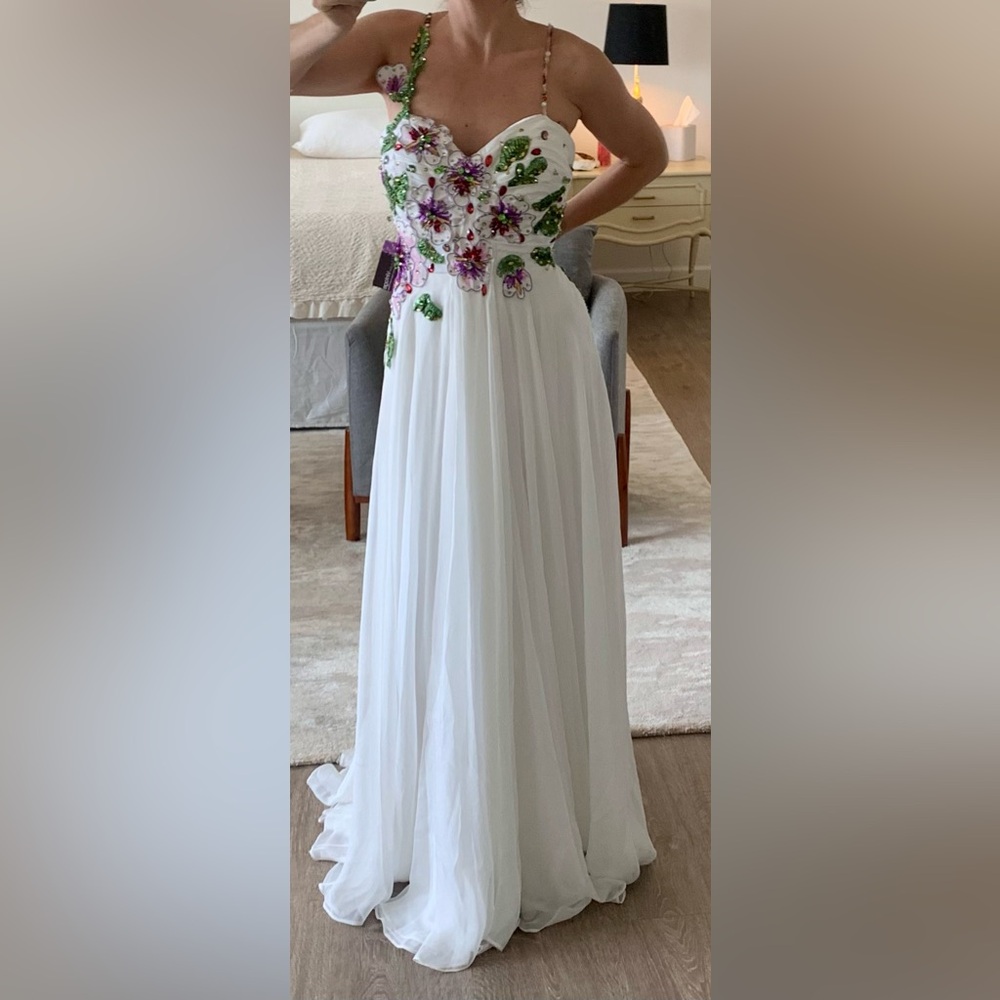Beautiful white and floral detail gown.